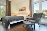 Ferienwohnung in Fehmarn OT Fehmarnsund - Strandresidenz Vogelflug Sundperle - Bild 1